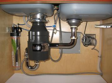 Badger 5 garbage disposal installed by a plumberi n Haltom City