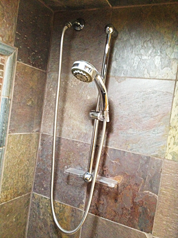 Shower wand installed by a plumber in Haltom City